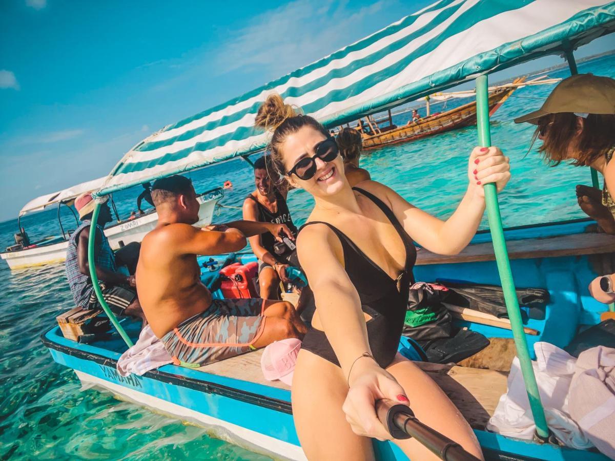 Zanzibella Hotel & Spa Кивенга Екстериор снимка A tourist on a boat in Zanzibar