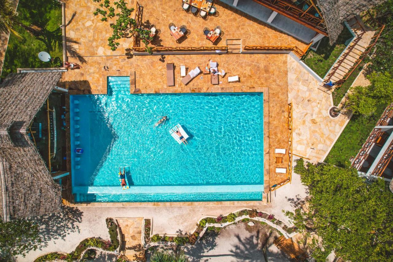Zanzibella Hotel & Spa Кивенга Екстериор снимка Aerial view of the swimming pool at the Hotel